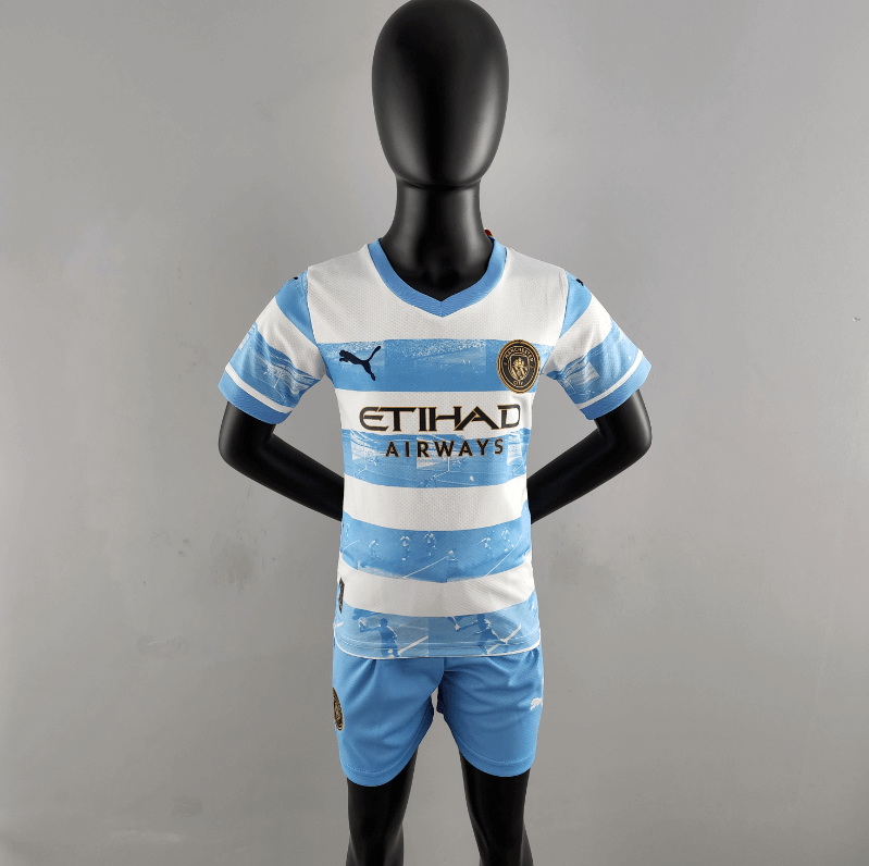 Camiseta 22/23 Manchester City Conmemorativa Blanca Azul Niño